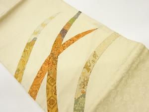 切り嵌め芝に華紋・草花・龍模様織出し名古屋帯